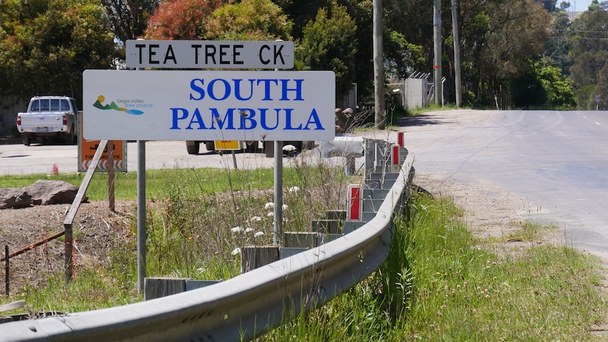 Road sign that says South Pambula next to the road