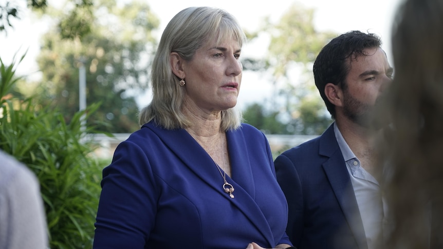 NT Government Minister Eva Lawler stands next to her colleague Chaney Paech at a press conference.