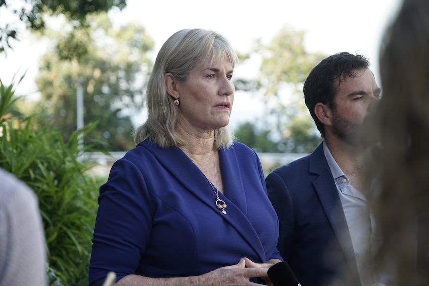 NT Government Minister Eva Lawler stands next to her colleague Chaney Paech at a press conference.