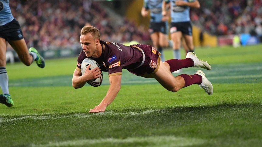 Daly Cherry-Evans scores a try for the Maroons in Origin III, 2018 against New South Wales.
