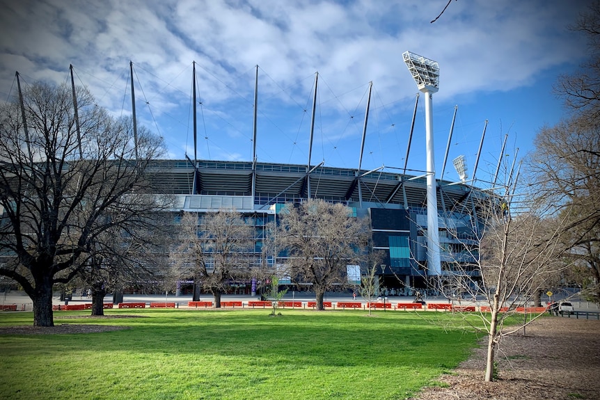 The MCG on a blue-sky day with nobody outside.