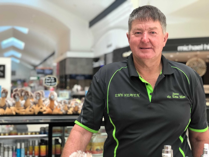 Emu Farmer Stephen Schmidt stands in front of his pop up stall in the Runaway Bay shopping centre.