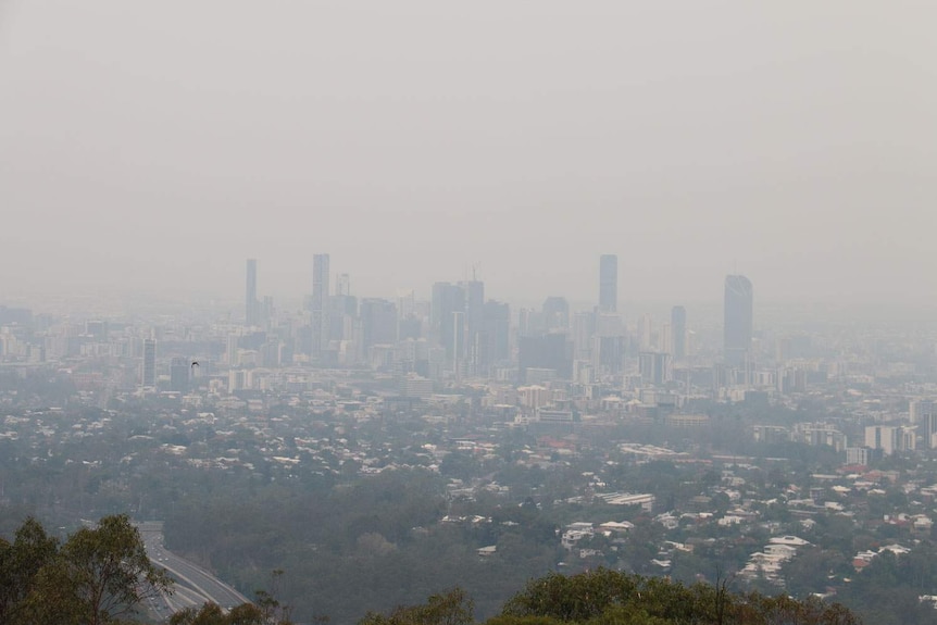Smoke haze covers Brisbane from Mt Coot-tha Lookout.