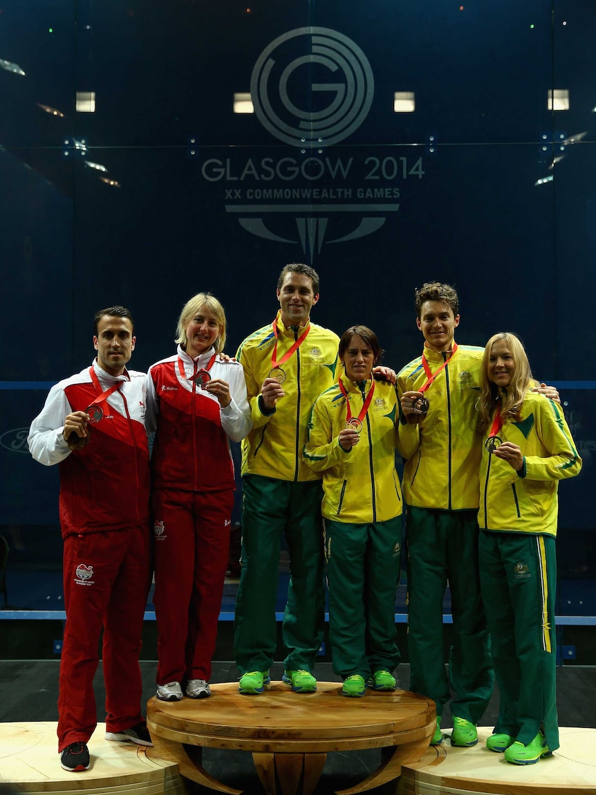 David Palmer, Rachael Grinham, Cameron Pilley and Kasey Brown show off squash gold and bronze medals