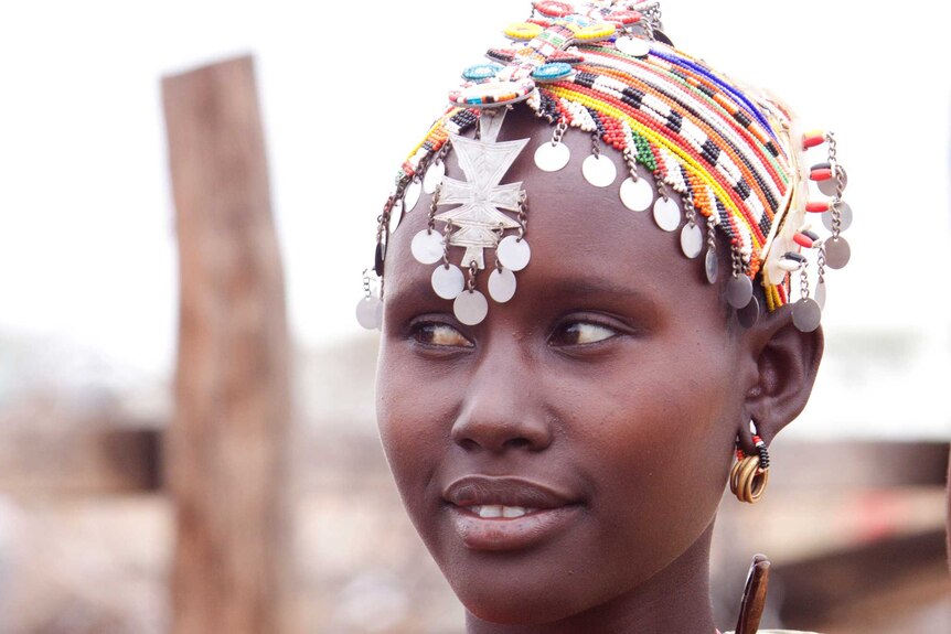 Kenya Melako girl with beads