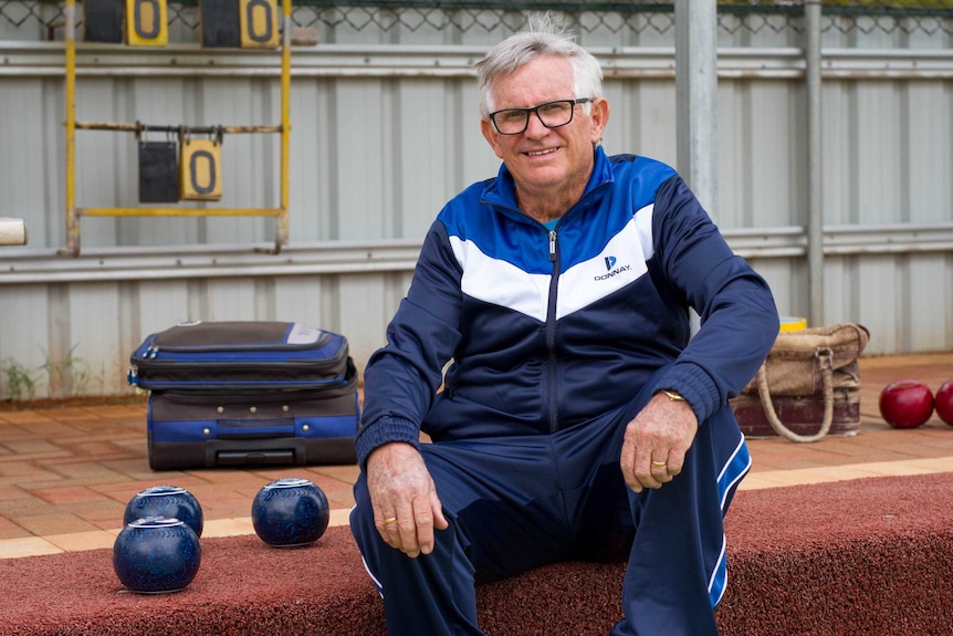 Kalgoorlie bowling club president Brian Osmetti gets ready for a game of bowls.