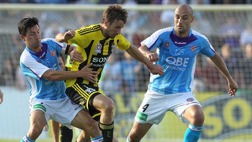 Not impressed ... Glory skipper Jacob Burns (left) has hit back at Wellington's claims