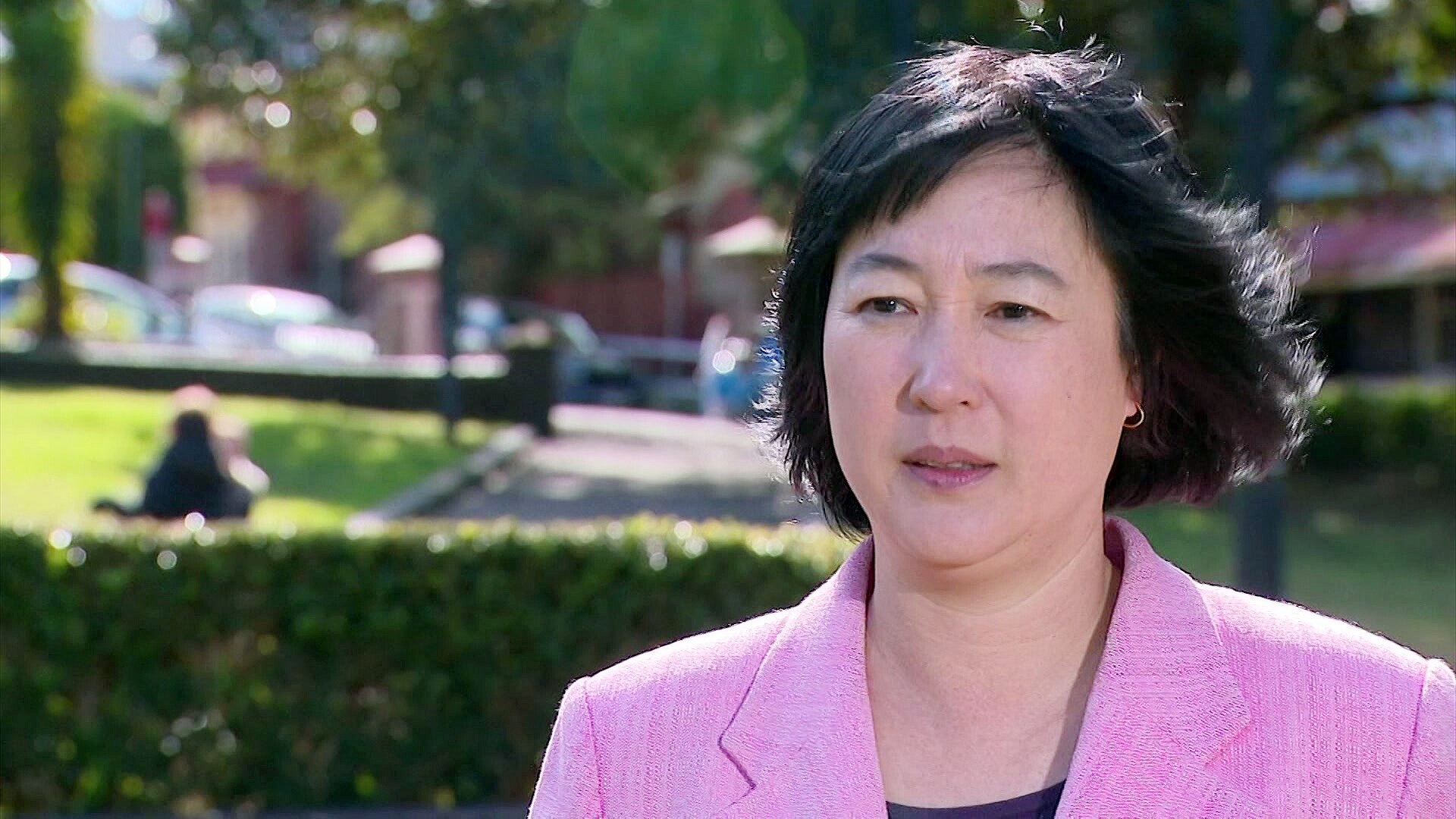 the greens Jenny Leong stands outdoors talking to the media about the government's no fault eviction reforms 