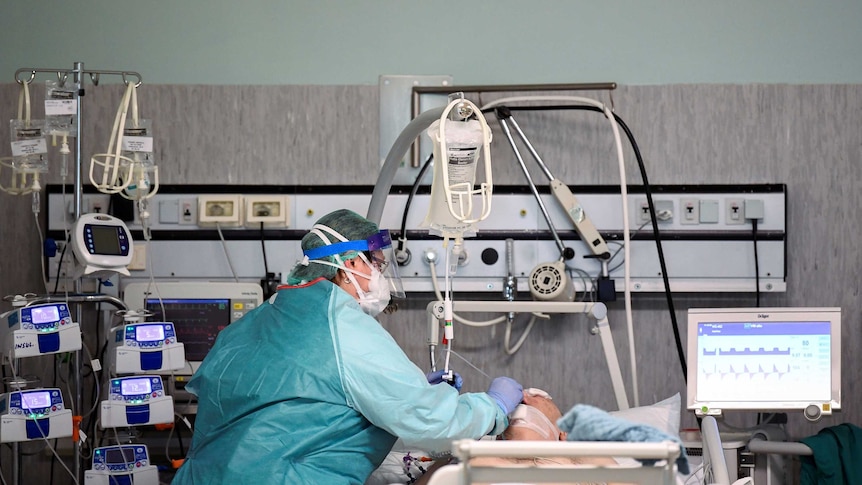 A patient being treated in the ICU.