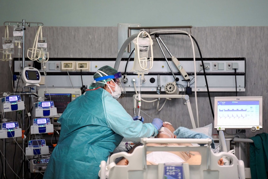 A patient being treated in the ICU.