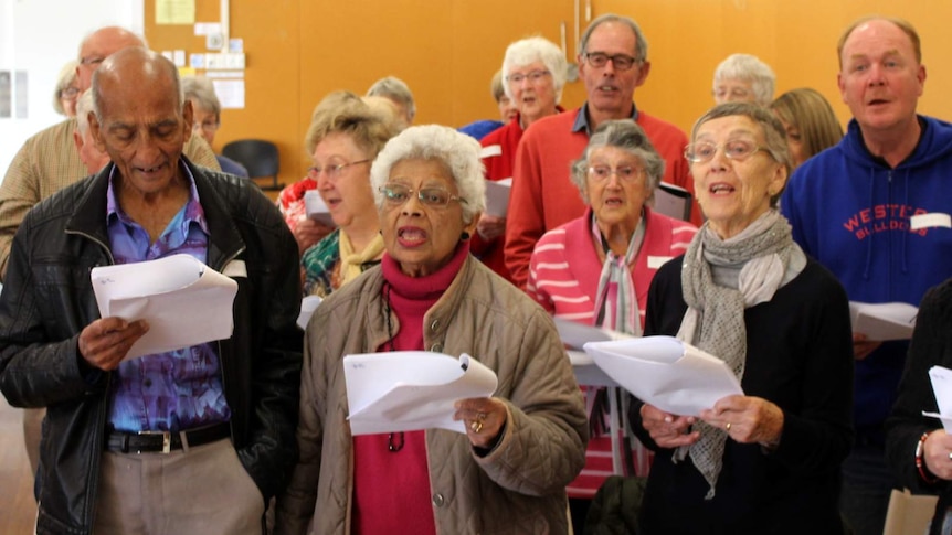 The Alchemy Chorus at a practice session at the Hughes Community Centre.