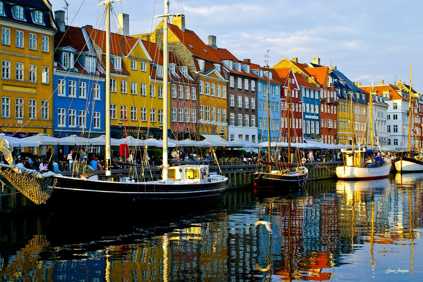 Bright-coloured buildings on a canal in Denmark.