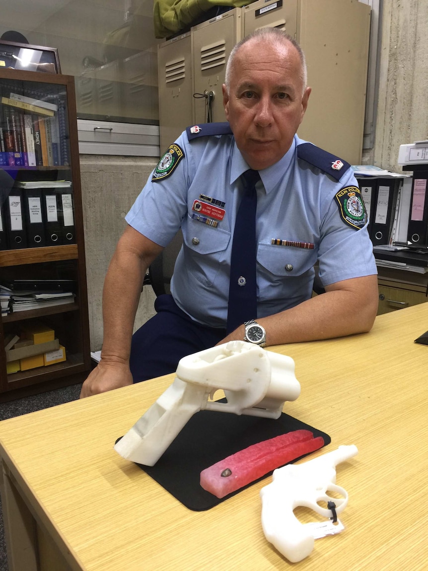Chief Inspector Wayne Hoffman with a 3D-printed gun.