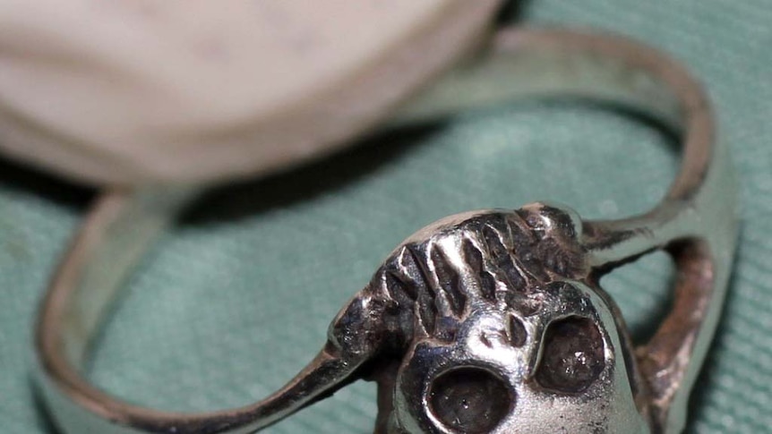 Police image of skull ring linked to Kurilpa Park murder