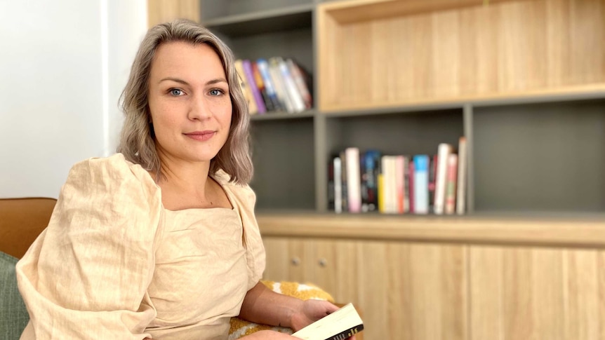 Serena Riley sits on a chair in an office at Wandi Nerida, Australia's first residential treatment facility for eating disorders