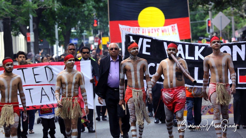 Muggera dancers with Bob Morgan lead the march, for the state funeral of Solomon Bellear AM.