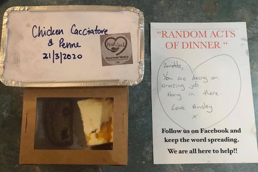 Takeaway meal labelled chicken cacciatore and penne with a box of cake and a note to Annette that says, 'Random acts of dinner'
