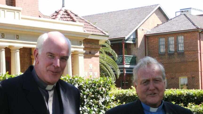 Bishop Michael Malone (on right) and his replacement Father William Wright