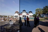 A composite image showing the Grand Mosque in Banda Aceh after the Boxing Day tsunami in 2004, and the same scene in 2014.