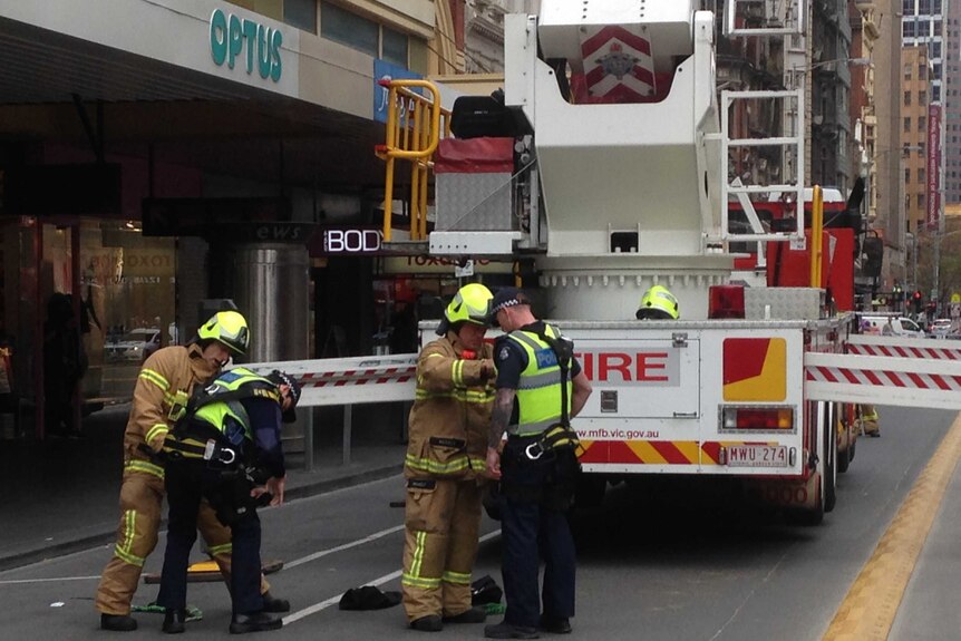 Police and firefighters on the scene at Bourke Street mall.