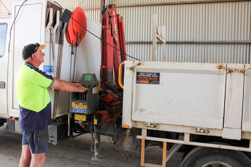 Charlie Young working crane that picks up roadkill