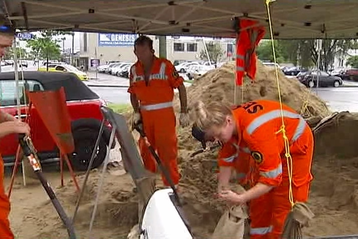 SES volunteers fill sandbags in Coffs Harbour as a low pressure system threatens.