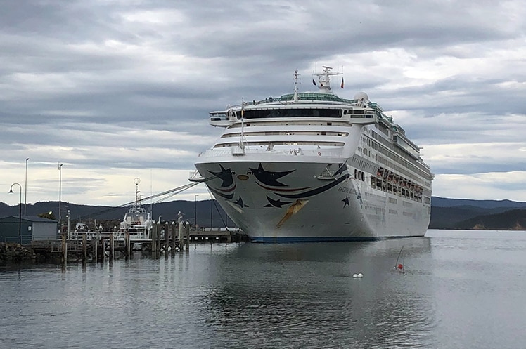 A cruise ship docks at a new quay