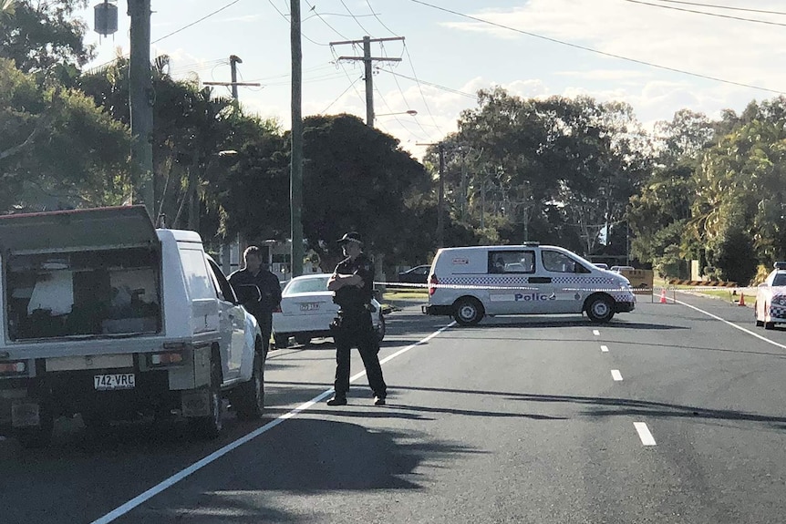Police cordon off street where man was shot dead during a fight between a group of men at Deception Bay.