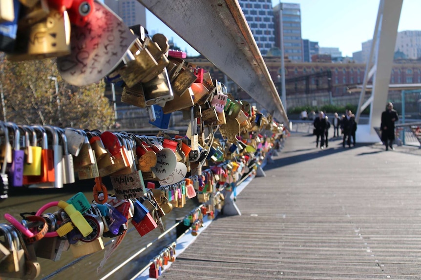 Love locks on the Southgate Bridge in Melbourne before they were removed.