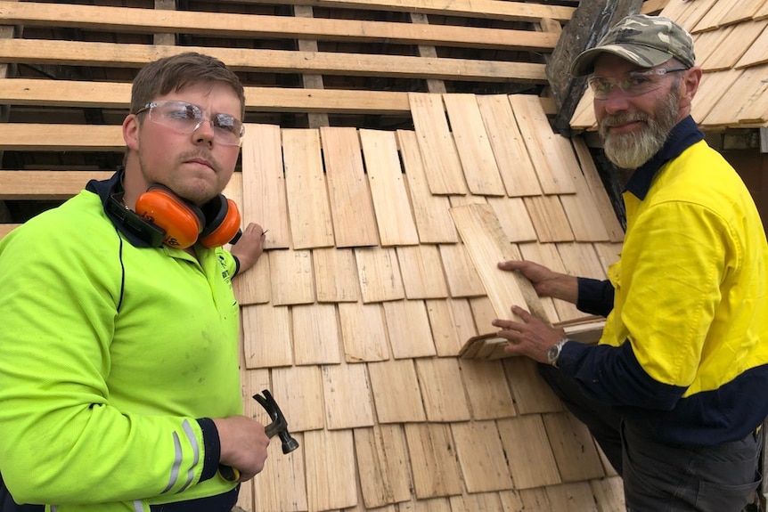 Heritage construction apprentice Jai Webber making roof shingles with builder Graham Green