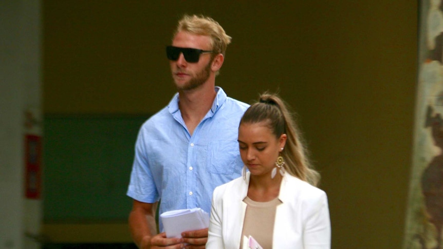 Ben Jenkins, wearing sunglasses, outside court with an unknown woman.