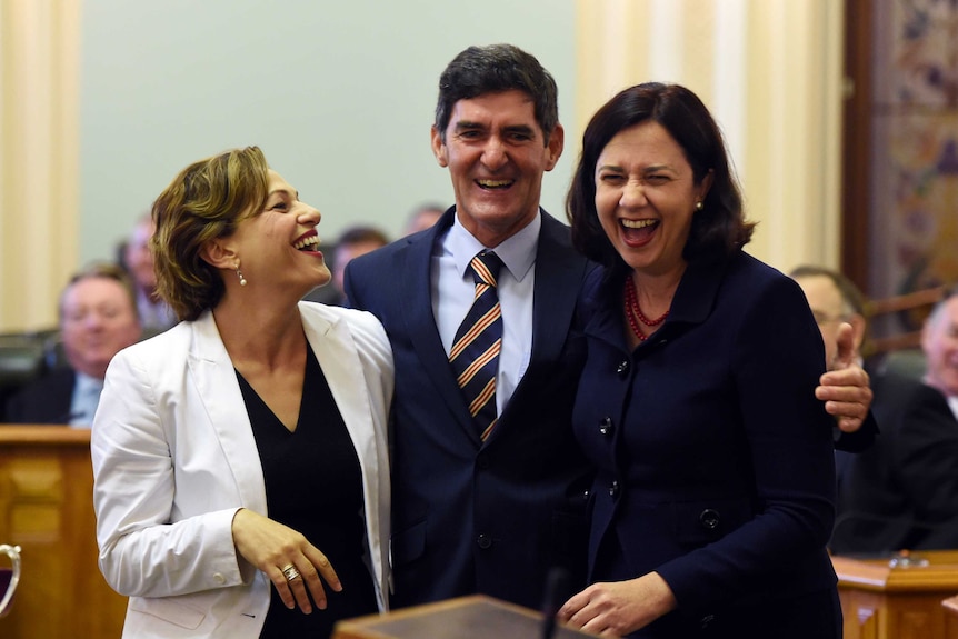 Ms Palaszczuk, Ms Trad and Mr Wellington in parliament.
