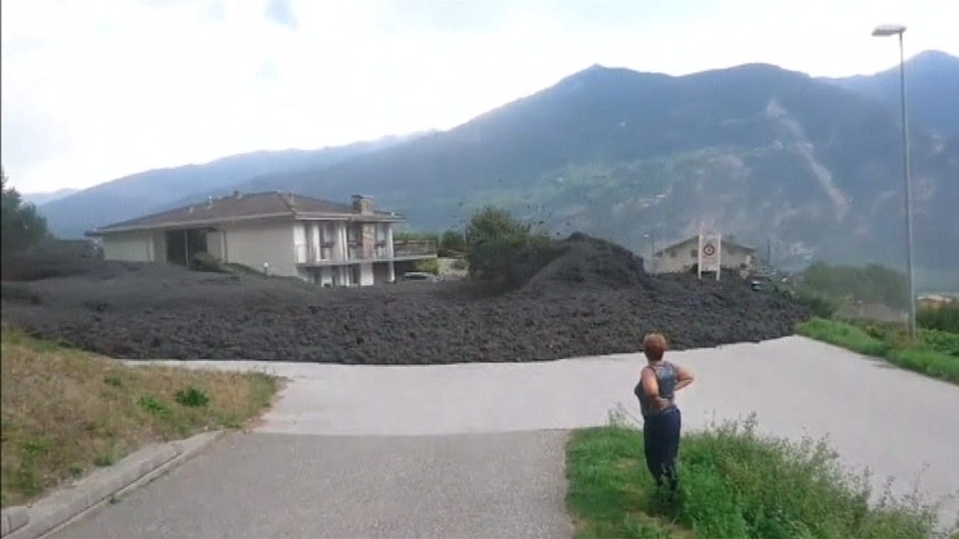 Powerful mudslide crashes through a village in Switzerland