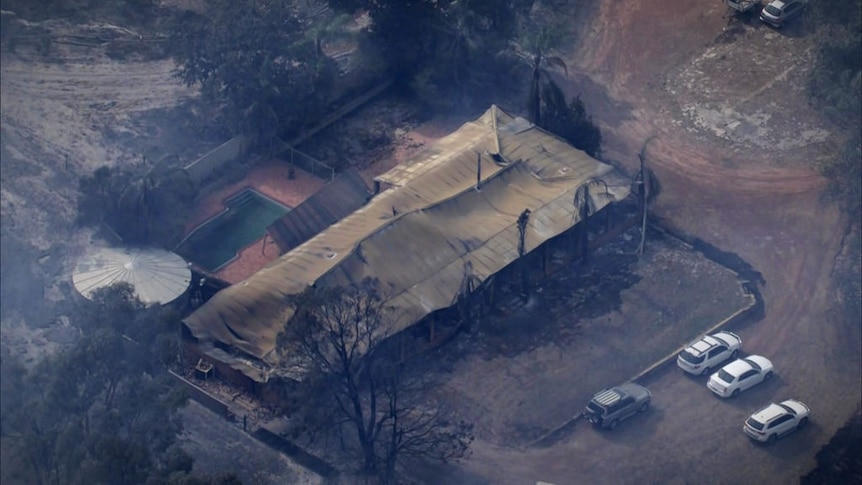 Vision taken via helicopter shows houses destroyed by fire north of Perth