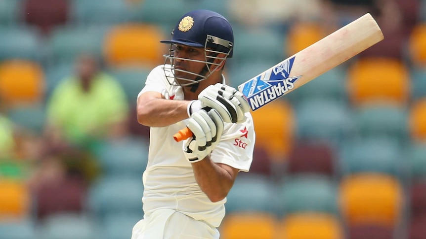 India's MS Dhoni bats on day two of the second Test against Australia at the Gabba.
