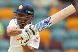 MS Dhoni hooks on day two of the second Test between Australia and India at the Gabba