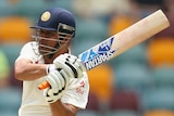 MS Dhoni hooks on day two of the second Test between Australia and India at the Gabba