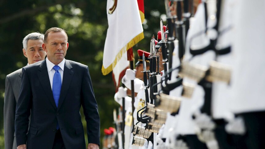 Tony Abbott, Lee Hsien Loong inspect honour guard in Singapore