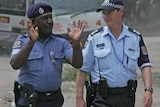 Australian Federal Police work alongside the Papua New Guinea Royal Constabulary