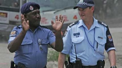 Australian Federal Police work alongside the Papua New Guinea Royal Constabulary