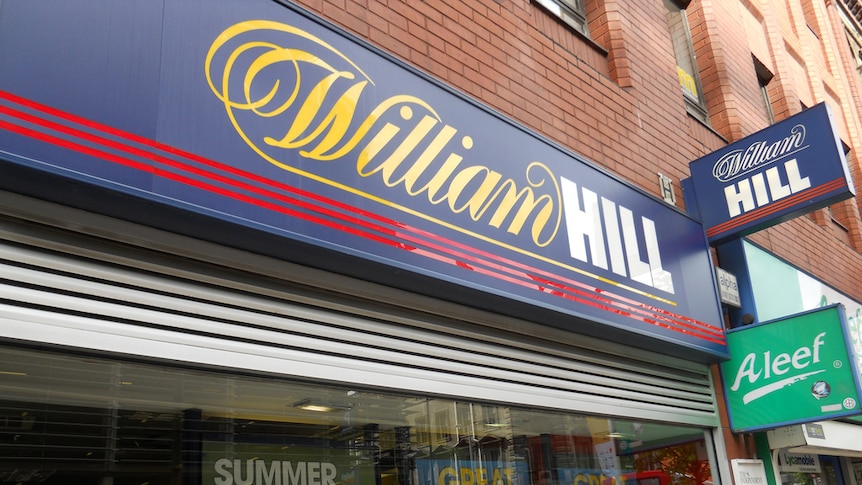 A shopfront for UK bookmaker William Hill in Manchester.