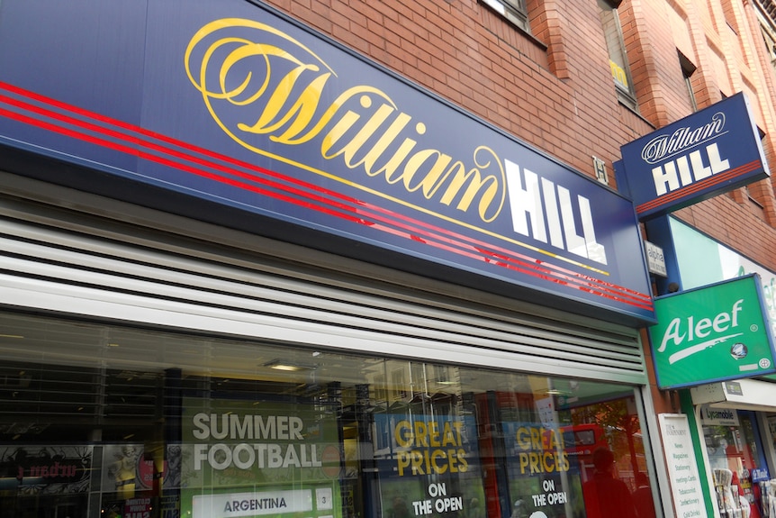 A shopfront for UK bookmaker William Hill in Manchester.