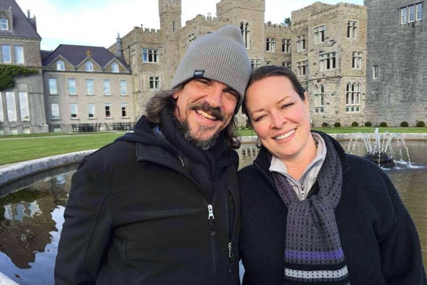 Kurt Cochran and his wife pose for a photo.