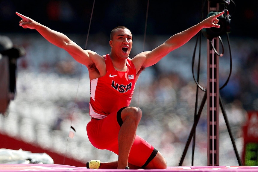 Ashton Eaton gestures during the decathlon pole vault event at the London Olympics.