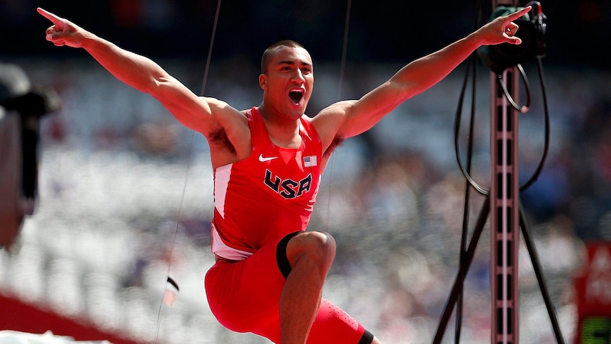 Ashton Eaton gestures during the decathlon pole vault event at the London Olympics.