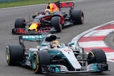 Lewis Hamilton in his Mercedes leads Daniel Ricciardo in his Red Bull