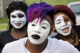 Black protesters don whiteface to mark Ferguson shooting anniversary