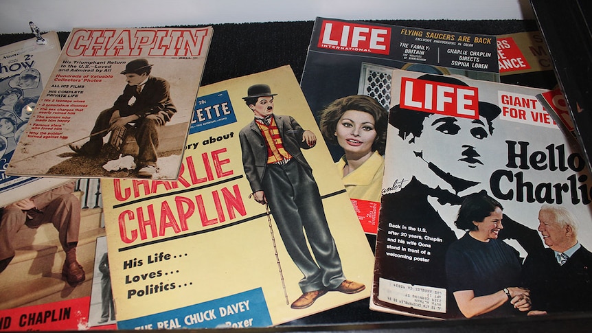 Pile of international magazines with Charlie Chaplin on the cover.