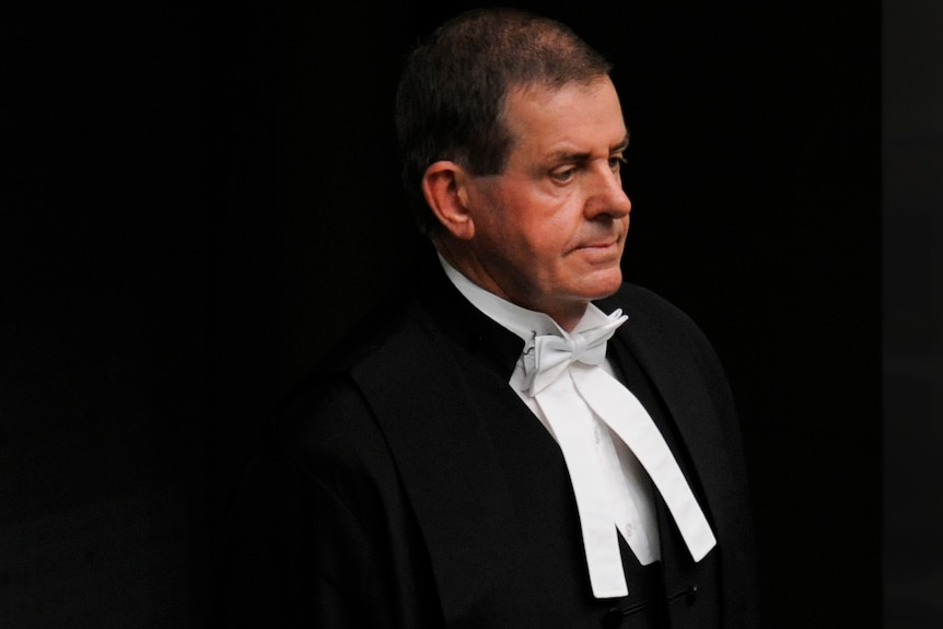 Speaker of the House Peter Slipper enters the Chamber at the beginning of House of Representatives question time.