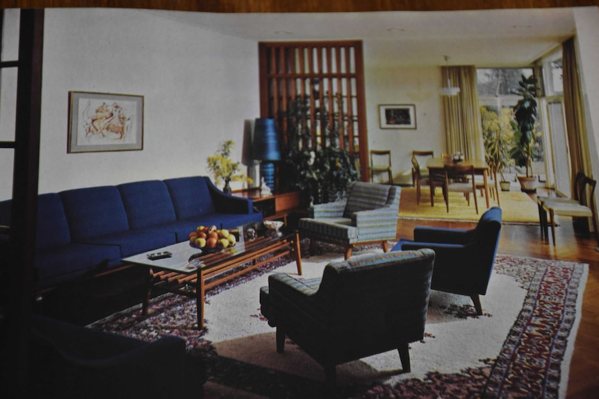 The interior of a home with 1960s-era furniture.